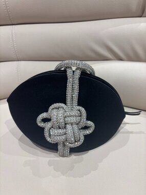 Kara Black Double Knot Clutch